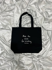 Tote bag “Make the World feel something”